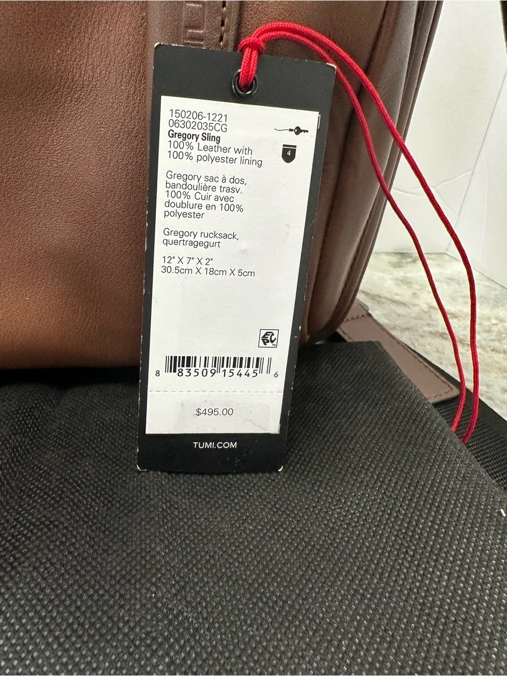 Tumi Brown Leather Messenger Crossbody with Black Strap